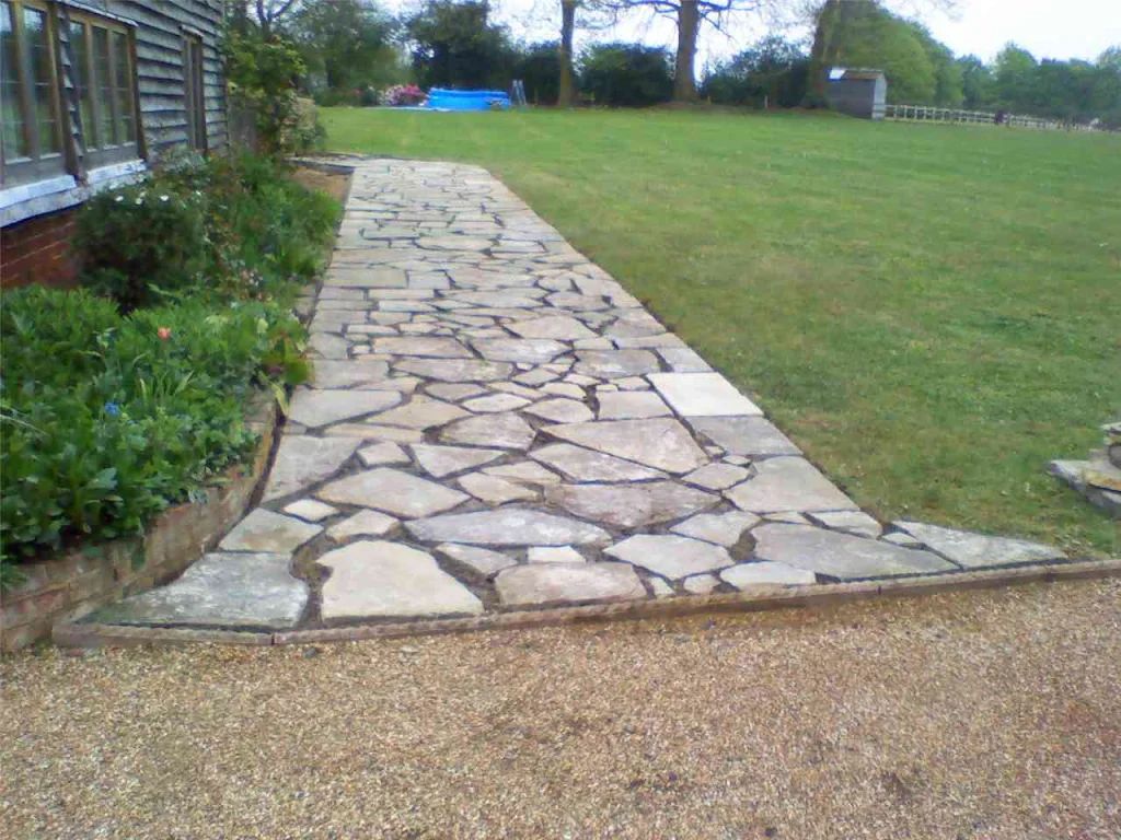 Stone path landscaping on large property